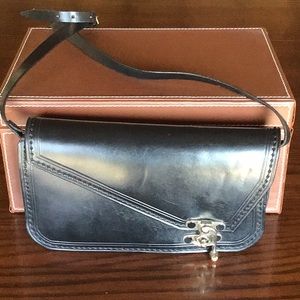 Black leather clutch with silver clasp
